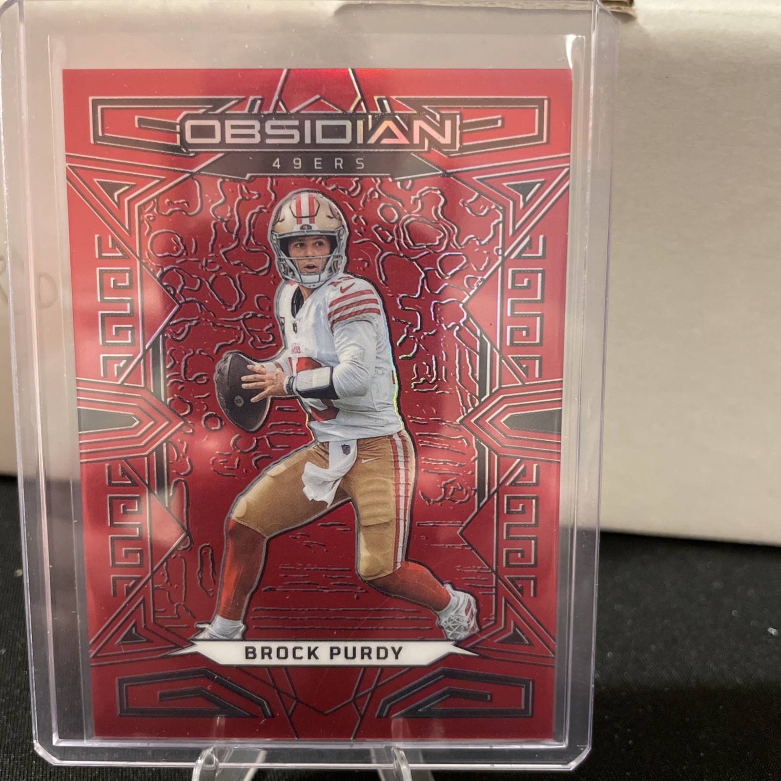 2023 Obsidian Brock Purdy #85 Electric Etch Red Flood 31/90 49ers