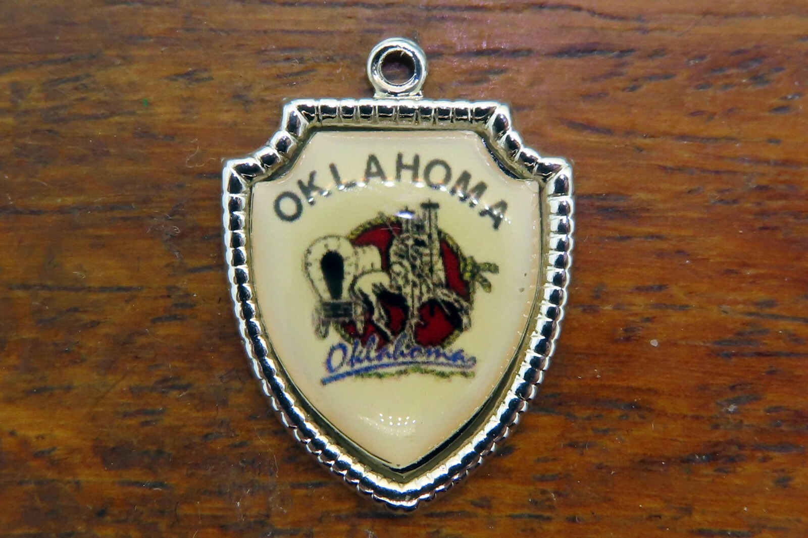 Vintage silver OKLAHOMA END OF THE TRAIL COVERED WAGON TRAVEL SHIELD charm 32-4