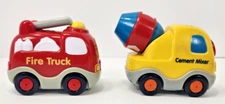 2 VTECH GOGO SMART WHEELS WORKS AND TESTED CEMENT MIXER AND FIRETRUCK