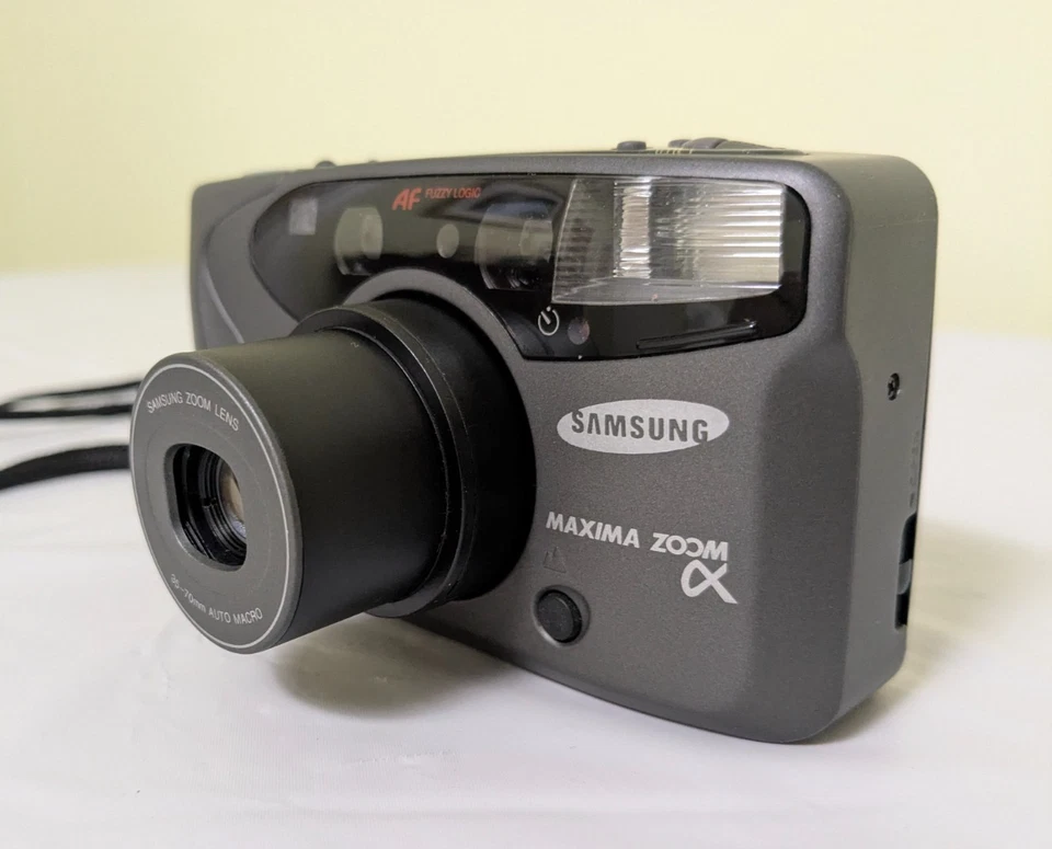 Cámara fotográfica Samsung Máxima Zoom Alpha 35 mm Point Shoot 38-70 mm con hombre - Funciona Foto 3 de 4