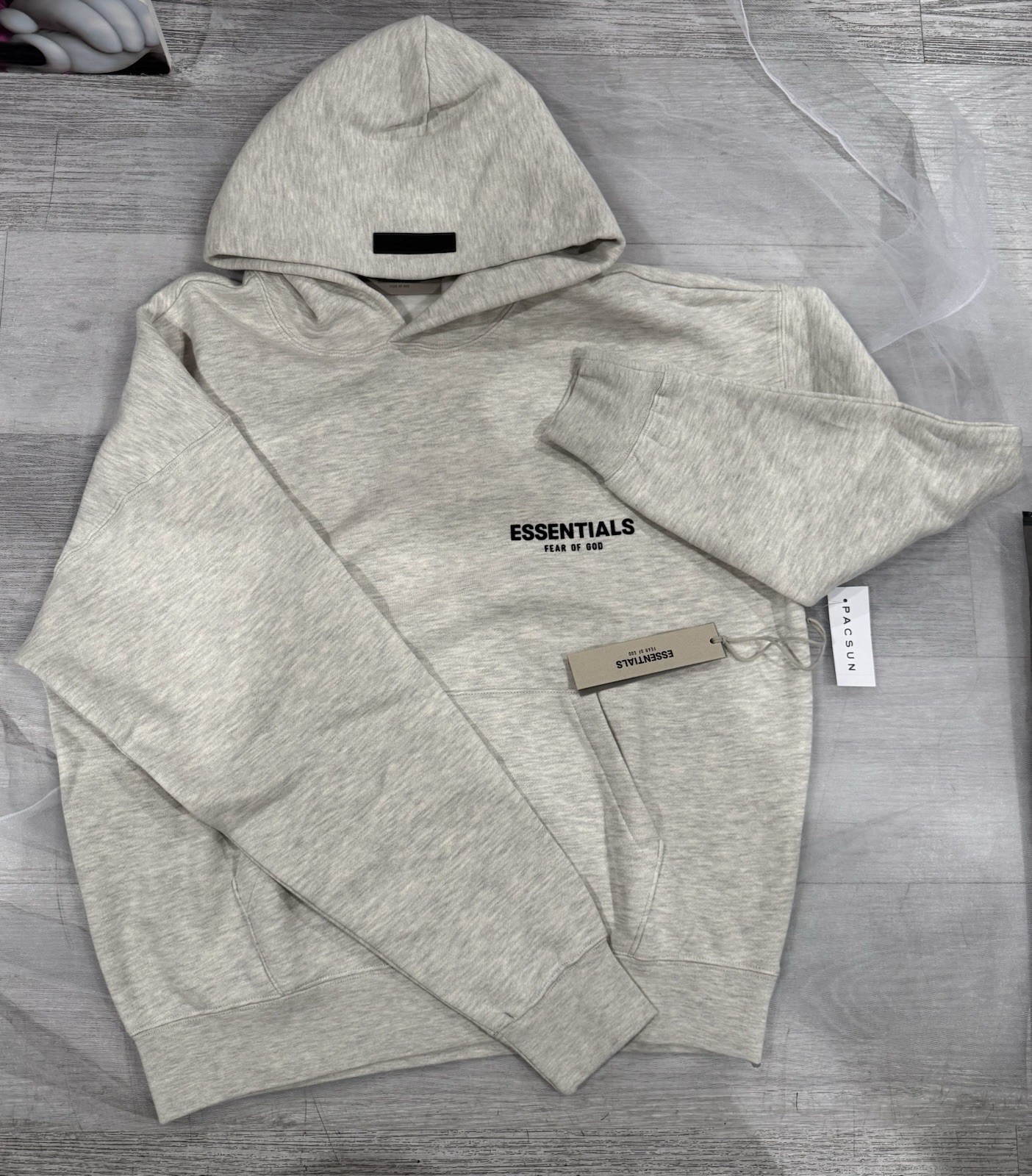 Essentials Fear of God Light Oatmeal Hoodie Long for Men and Women both can wear