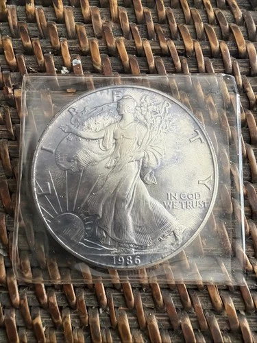 1986 American Eagle Silver Dollar - Uncirculated / Slight Toning