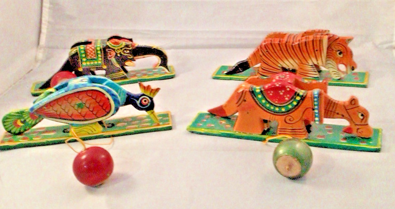 Four Hand painted Wooden Toy Animals with action from Europe
