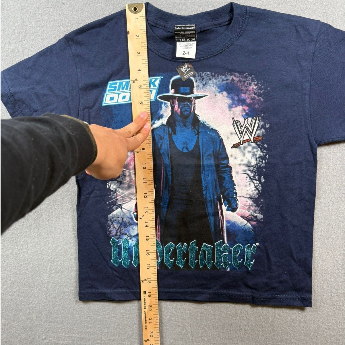 WWE Superstar Graphic Tee – SmackDown Edition | Tag 2-4-Fits Youth S | Navy Blue