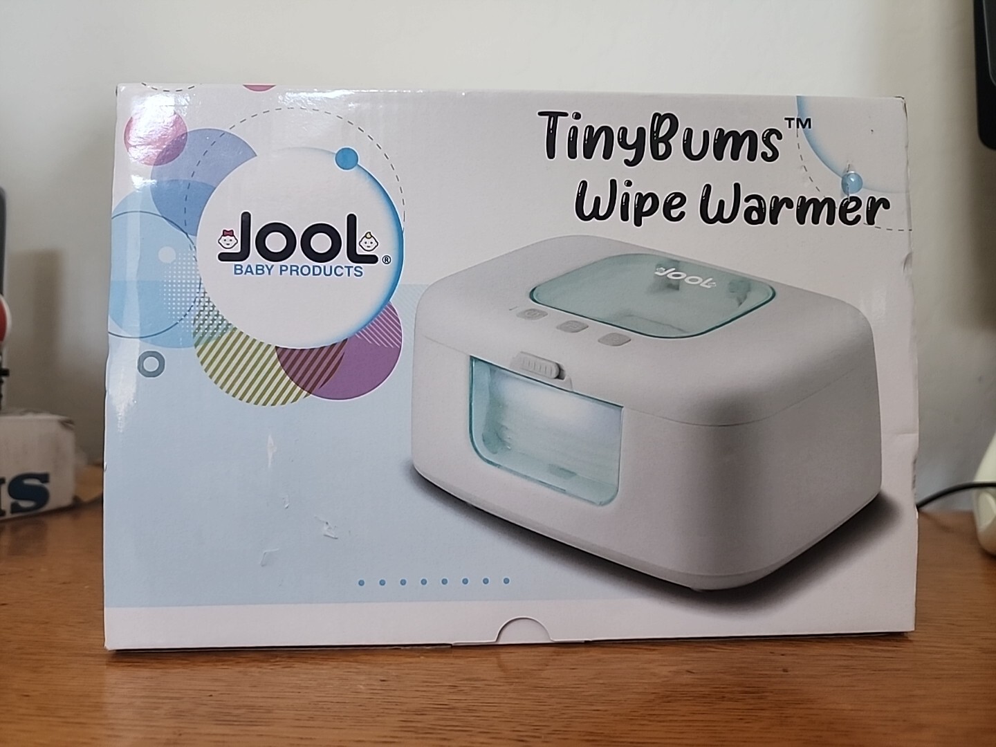 Calentador y dispensador de toallitas para bebé JooL TinyBums luz cambiante encendido/apagado aguamarina