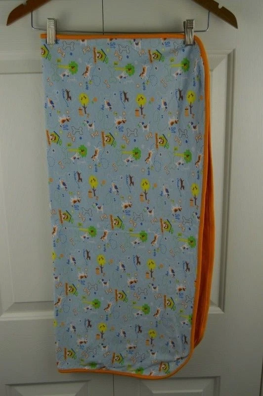 Manta para bebé Zutano cachorro perro azul naranja casa para perros hueso buscar sentarse permanecer seguridad Foto 2 de 4