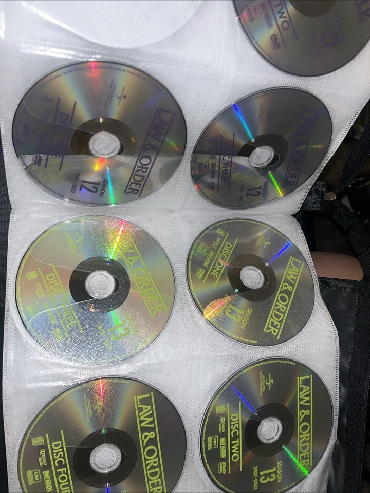 Binder of DVDs Classic TV shows and Crime Law & Order, The Equalizer