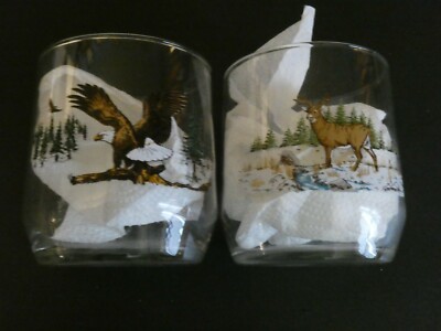 SET OF 2 GLASSES - DEER AND EAGLE - DESCRIPTION ON BACK  ( BX 33)