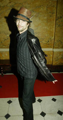 Jay Kay a.k.a. Jamiroquai enjoys himself at 2003 Brit Awards after- Old Photo 13