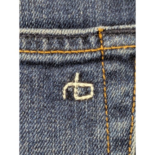 Close-up of Rag & Bone Fit 2 Slim Jeans, blue denim with orange stitching and white button closure, M1223K510THP.