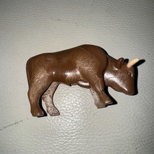 plastic bull with moveable head brown  4" x 2" excellent cond.