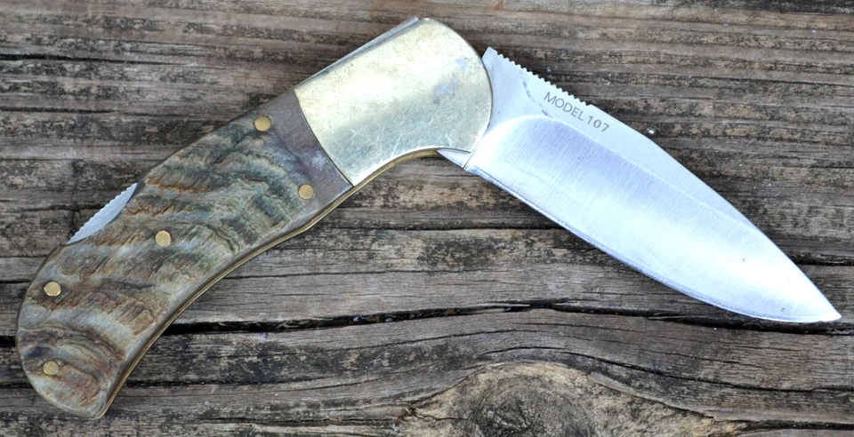 Cuchillo plegable Browning Full Curl 107 hoja plana de acero mango de cuerno de oveja Foto 2 de 4