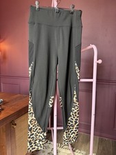 Women  s Black Leggings With Leopard Print And Side Pockets Size Medium