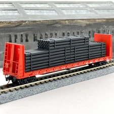 Micro-Trains N Scale Canadian Pacific Bulkhead Flat Car with Pipe Load CP 317138
