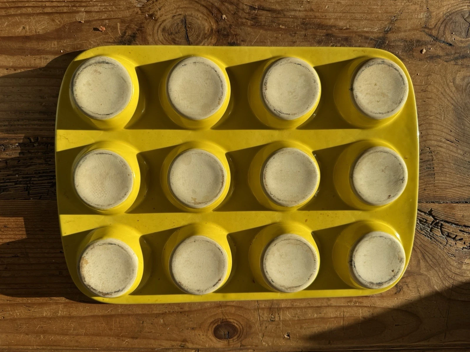 Yellow cast iron muffin Pan