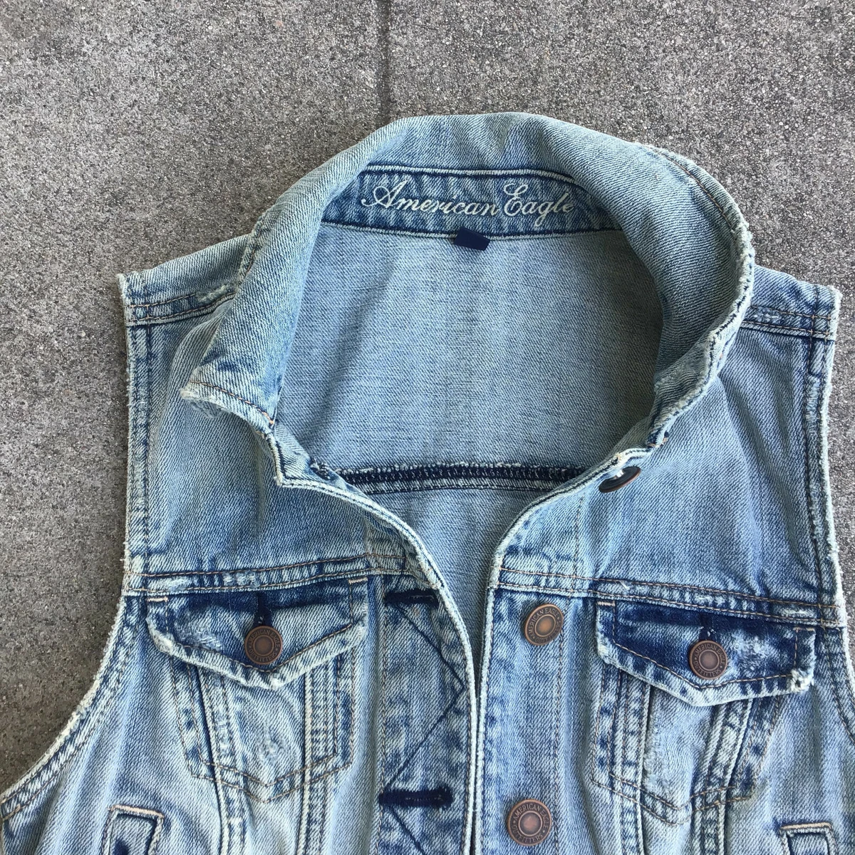 Light blue top jean vest