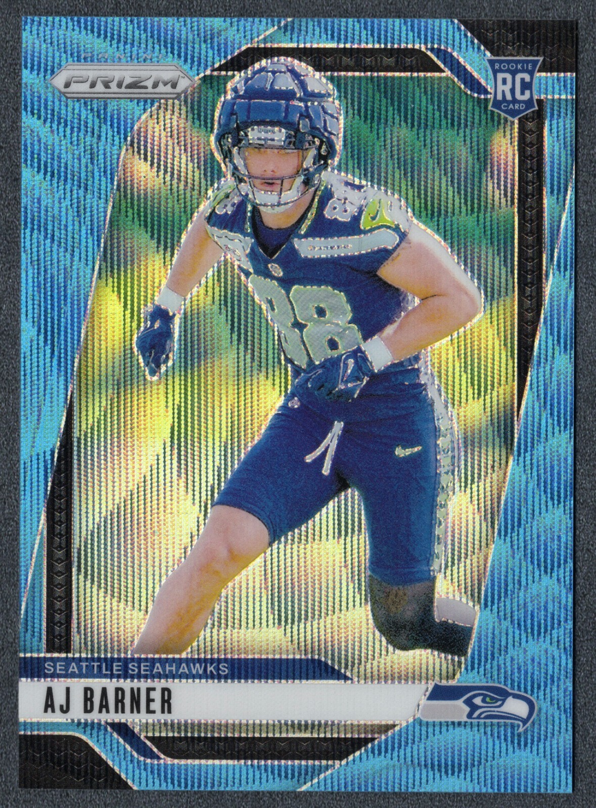 2024 Panini Prizm Football AJ Barner RC Blue Wave 083/230 #YPM1