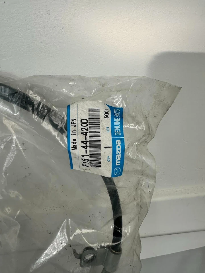 04-08 Mazda RX-8 OEM задний кабель (левый стояночный тормоз кабель) - F151-44-420D новый  - Изображение 2 из 4
