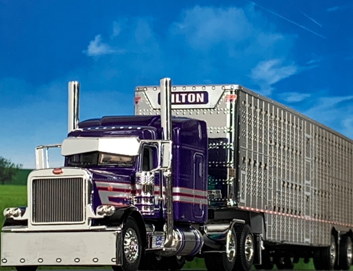 1/64 DCP HILTON PETERBILT 389 63