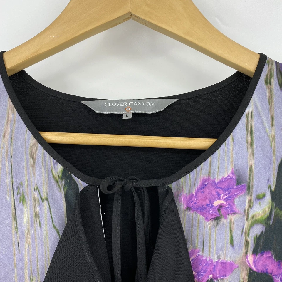 Mameluco Clover Canyon talla grande para mujer negro púrpura floral con volantes manga larga Foto 3 de 4