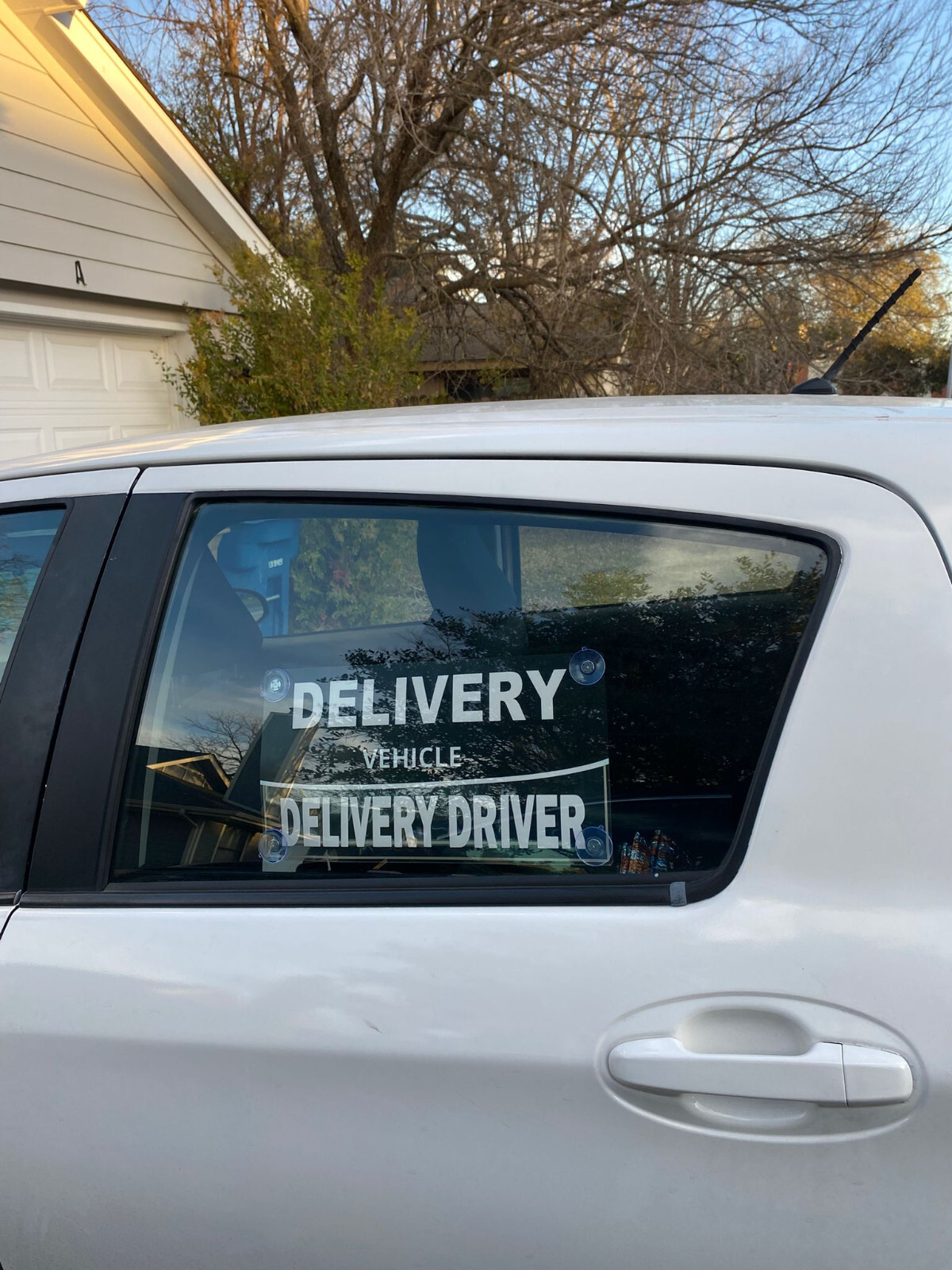 delivery driver car sign