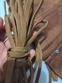 Women's corset with laces, metal hooks and flexible boning, brown.XL