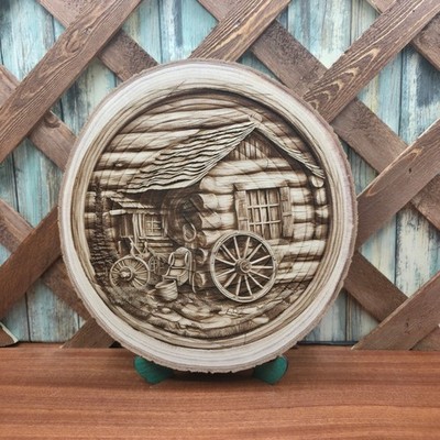 Rustic Log Cabin and Wagon wheel Laser Engraved on a live edge Paulownia Wood