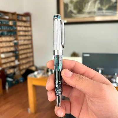 Handcrafted mother-of-pearl fountain pen fitted with Schmidt size 5 nib.