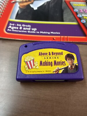 Quantum Pad Learning System Making Movies Book and Cartridge Above