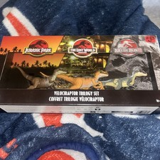 Jurassic World Jurassic Park I II and III Velociraptor Trilogy Set 3 Box Dent