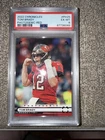 2022 Panini Chronicles - Photogenic Tom Brady #PH-25 Red /199 psa 6