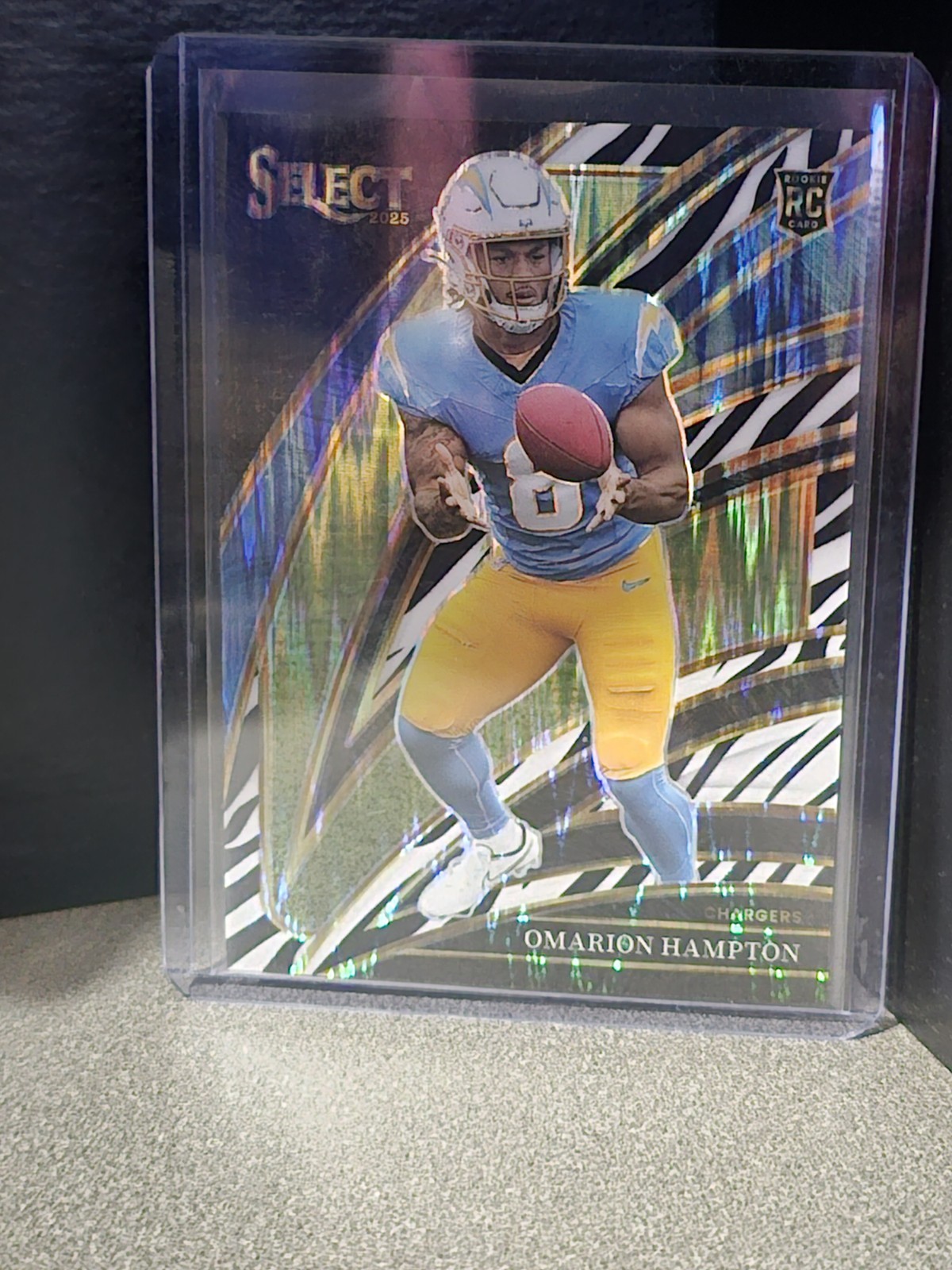 2025 Panini Select - Club Level Omarion Hampton #202 Zebra Shock Prizm (RC)