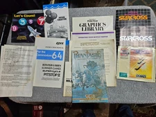 Misc Commodore 64 game boxes, manuals, poster