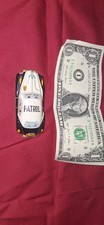 small tin toy patrol police car black and white