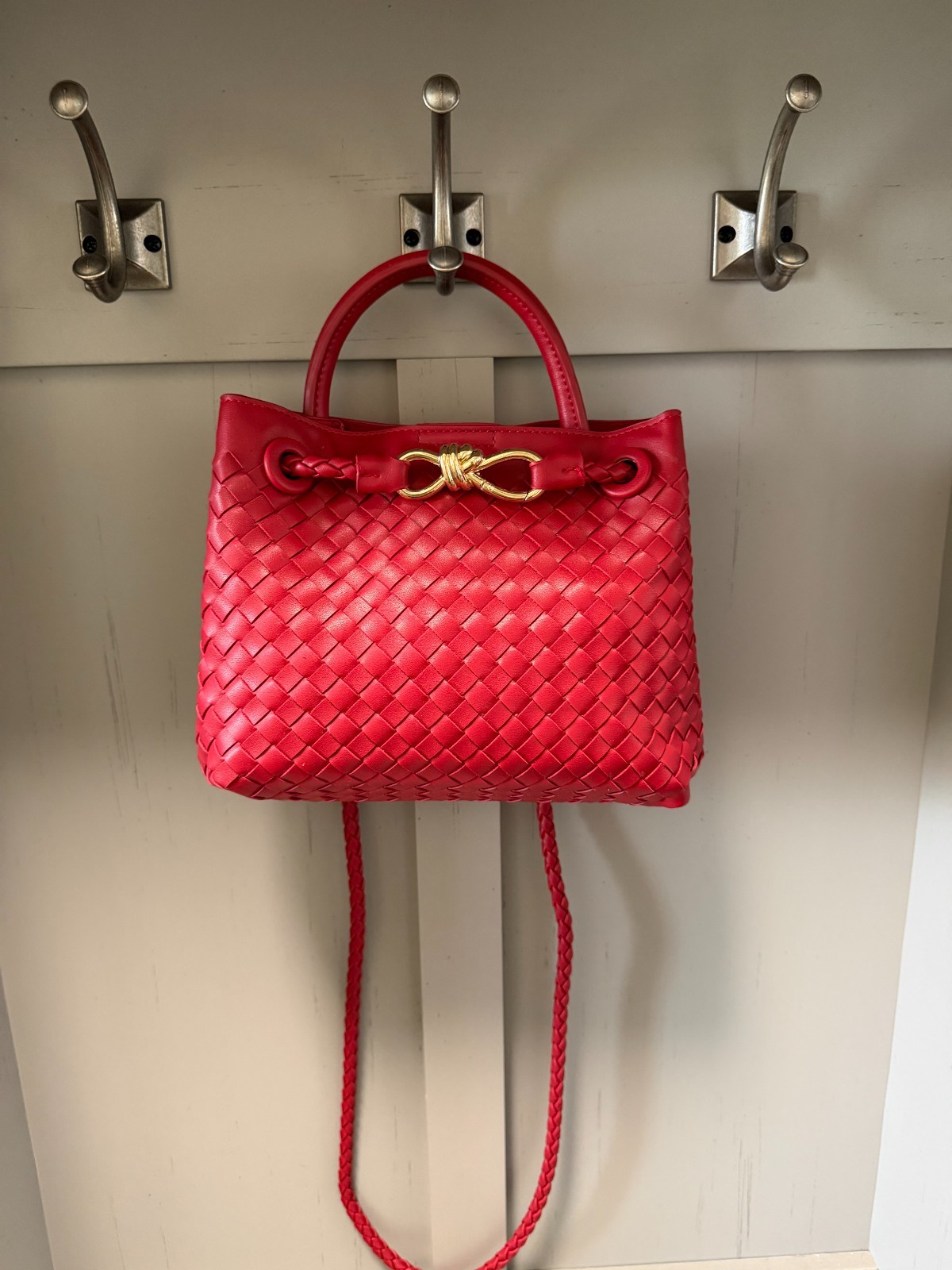 Woven Vegan Leather  Crossbody Bag in red with top handle and gold tone accents