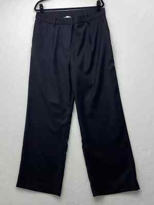 h&m black dress pants Men's Used 36X30 PNTS-036628 mock welt pockets at the back and wide legs with creases at the front and back. Women's Black Capri Dress Pants
