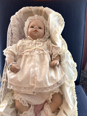 Bundle of Joy Porcelain Baby Doll in White Wicker Basket