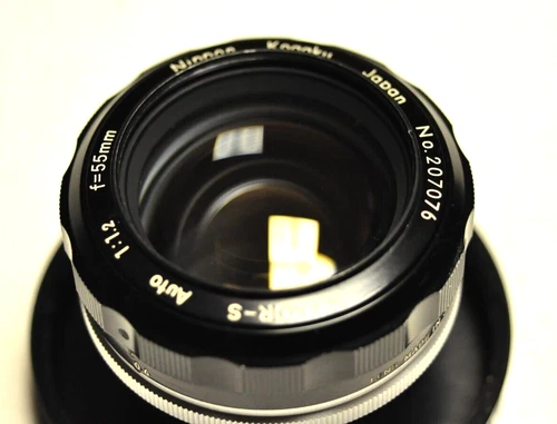 Nikon NIKKOR-S 55mm f/1.2 Ai converted manual focus lens with cap & bubble. 