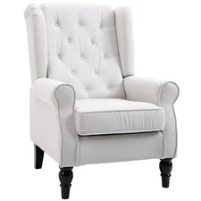 Soft armrests and thick tufted cushions emphasize the high-wing-back chair