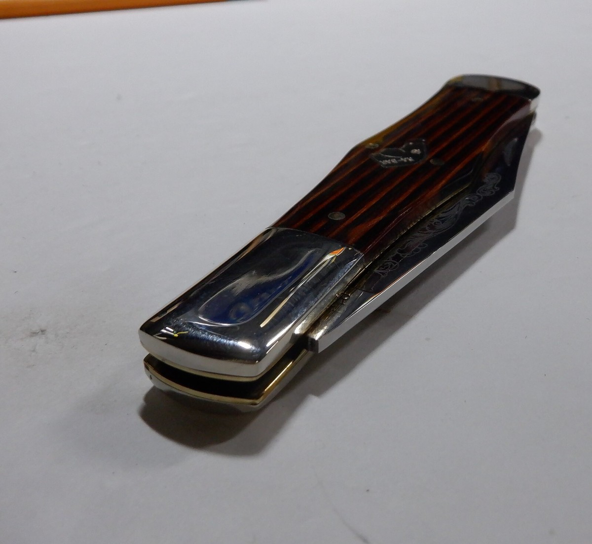 KaBar Collectors Club #5309 1983 Stipped Wood Dog Head Coke Bottle