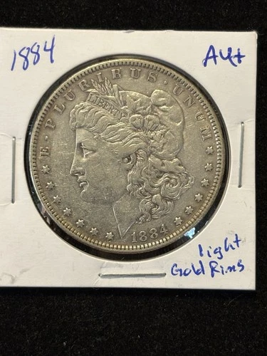 1884 Morgan Silver Dollar $1 AU+ Light Gold Rim Toning, Nice Coin
