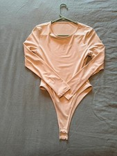 Women's Long Sleeve Tan Bodysuit with Snap Closure