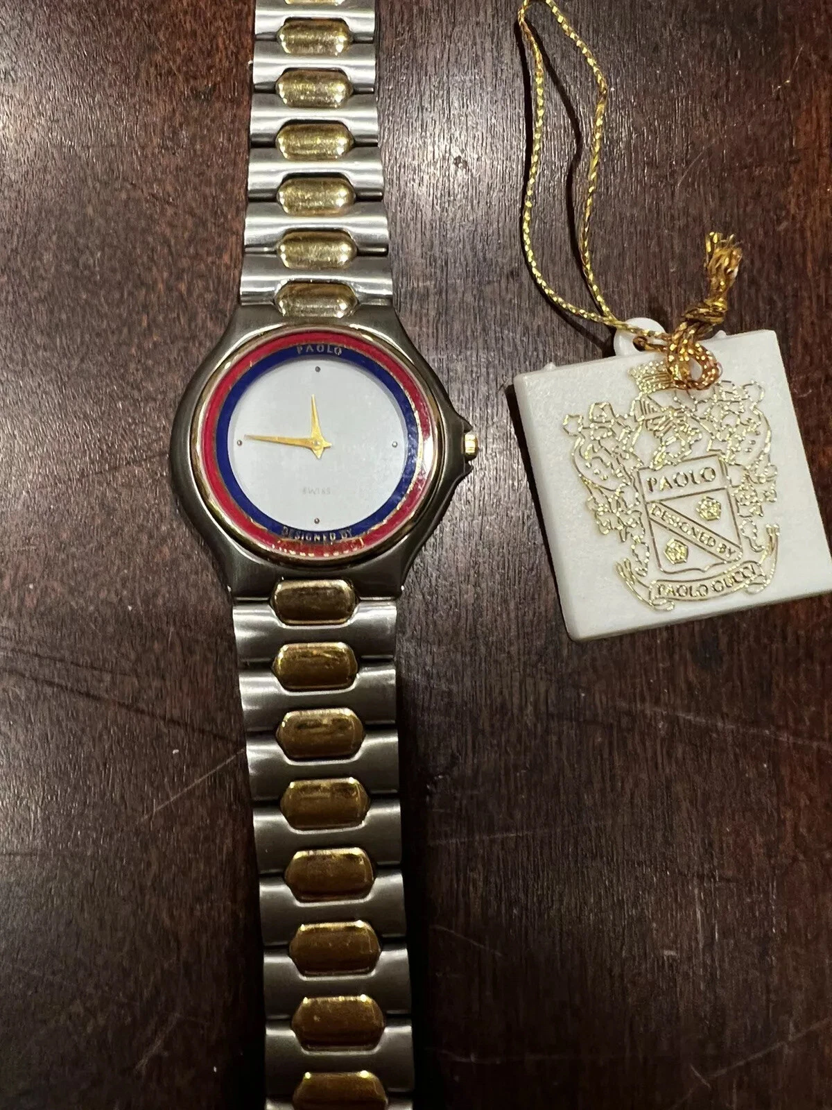Montre Gucci Paolo femme homme deux tons or et acier inoxydable cadran plat blanc neuve avec étiquette