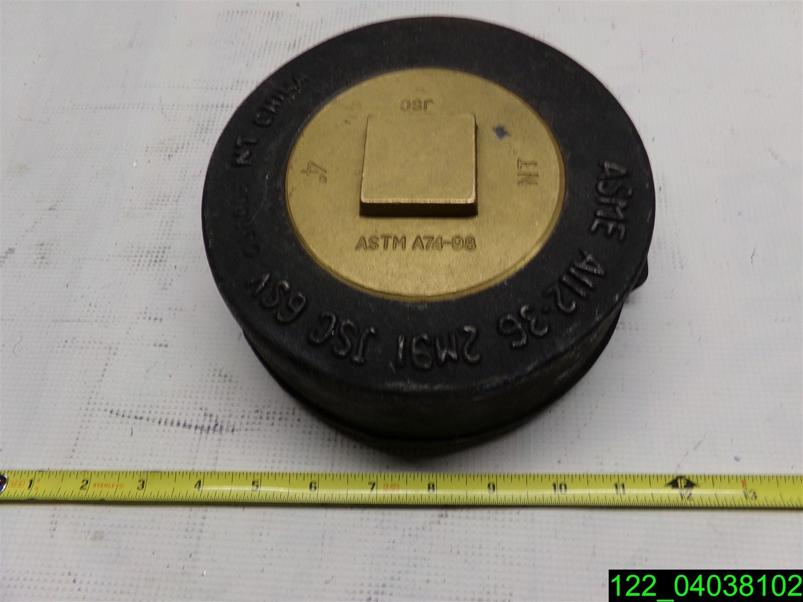 CAST IRON CLEANOUT 4" BRASS RAISED HEAD PLUG (BOTTOM OF CAST IRON 7" ID