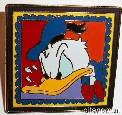 donald duck head face profile in a colorful square framed stamp