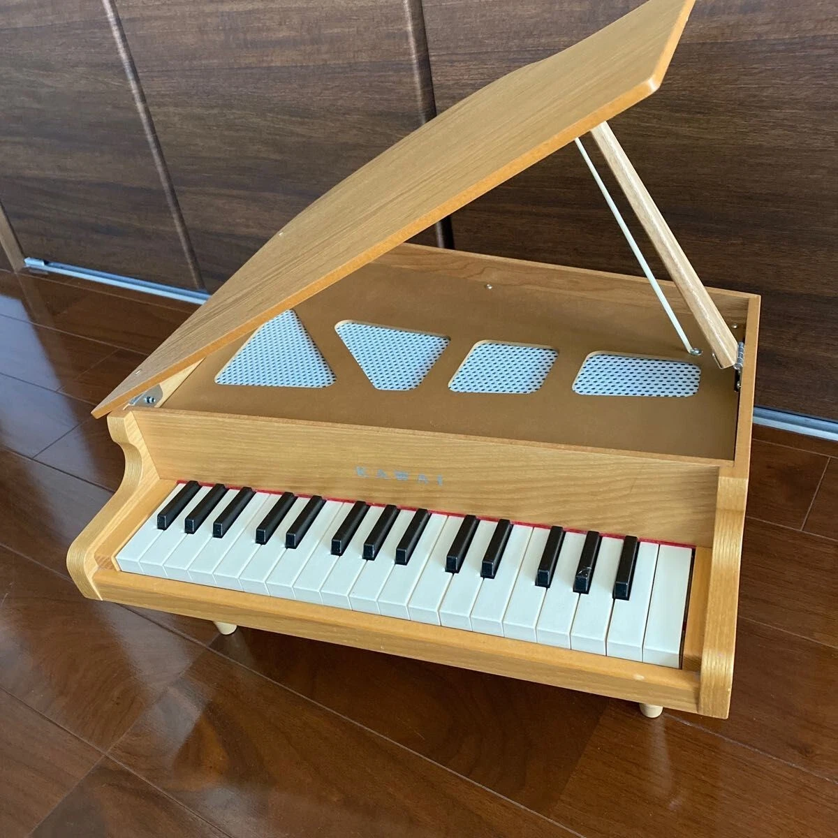 Natural wood piano online
