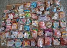 MCDONALDS HAPPY MEAL TOY LOT, 55 PIECES, UNOPENED, PREOWNED