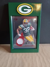 Packers Card Frame (130 pt) and Pinnacle Express Materials Marshawn Lloyd /75