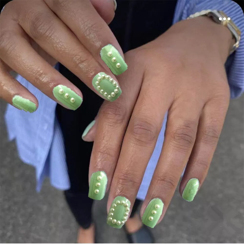 Closeup Of Woman Fingers With Nail Art Manicure In Neon Green High-Res  Stock Photo - Getty Images