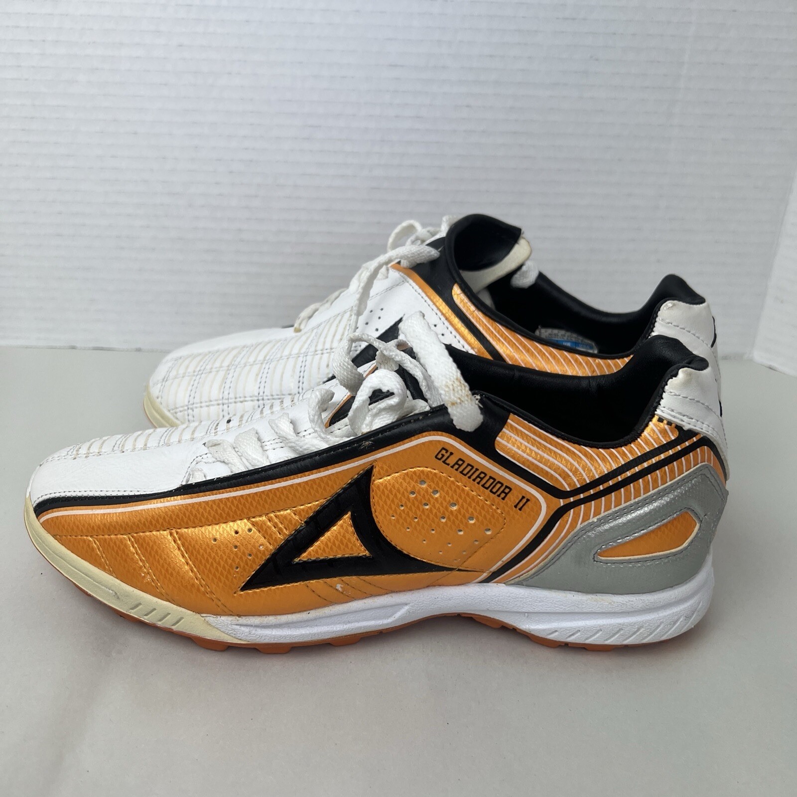 Pirma cleats/shoes 7.5 men From Mexico Gladiator II . Orange/white